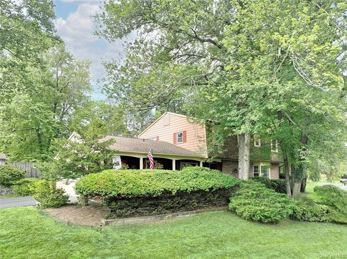 Welcome to this delightful, move-in ready home in a sought-after neighborhood! An inviting front porch with a terra cotta tile floor and an ornate front door set the tone for what&rsquo;s inside. The living room boasts a cozy gas fireplace surrounded by granite and built-in shelves, while the family room offers a wood-burning brick fireplace both perfect for cooler evenings. Freshly painted rooms (2024) and refinished hardwood floors (2023) add a touch of modern elegance throughout. All the bedrooms are spacious, including the primary suite with two walk-in closets and an updated ensuite bath. Step outside to a fenced backyard with a patio and awning, ideal for outdoor living.