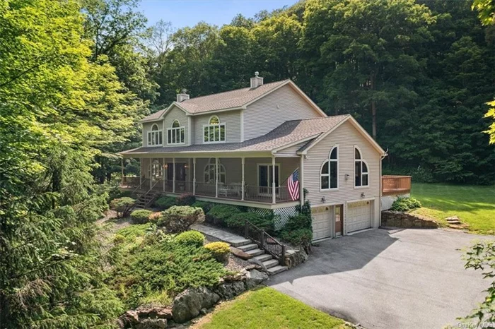 Tucked in the rolling hills of New York&rsquo;s lower Hudson Valley, just minutes from the vibrant riverfront village of Cold Spring, is this delightful one-owner custom contemporary colonial home offering luxury amenities and privacy among the wooded and serene Lane Gate Road. The meandering driveway leads to a beautifully landscaped front entry with full-length front porch overlooking the delightful grounds. The two-story sun-soaked entry hall leads to a large chef-style, eat-in kitchen with granite counters, center island and high-quality appliances. The kitchen is open to a great room with soaring, vaulted ceilings and a stone fireplace for ambiance and seasonal comfort. Hardwood floors and large custom windows bring in seasonal views. These areas combined with the adjacent formal dining room hit every entertaining note you can think of. What&rsquo;s more is the rear deck overlooking a level lawn providing for relaxation and fresh air in all seasons. A bonus room could serve as office / den or library. Upstairs are 3 bedrooms and 2 full bathrooms, including the primary suite with luxurious bathroom en-suite. In every aspect the home feels comfortable, private, yet welcoming with free-flowing floorplan. The unfinished basement is open for opportunity and the attached lower-level, 2-car garage is perfect for keeping your vehicles and toys out of the elements.  Enjoy all the Lower Hudson Valley and the Cold Spring / Beacon / Garrison area have to offer including world-class outdoor recreation, dining, arts institutions and more. Minutes to Boscobel, Hudson River waterfront, Magazzino, Manitoga, DIA Beacon and more. Approx 50 miles to NYC and just over 1hr via metro north Hudson Line. Here and now is a unique opportunity for weekend retreat or forever home.