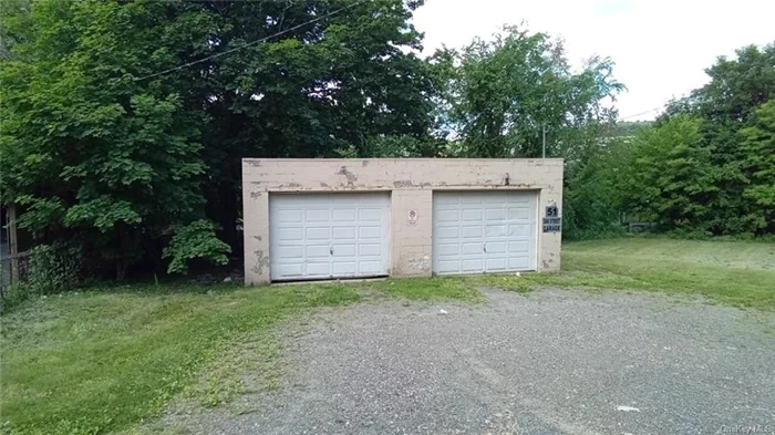 Check out this two-car garage, which is very private and perfect for a person who wants to use it for storage.