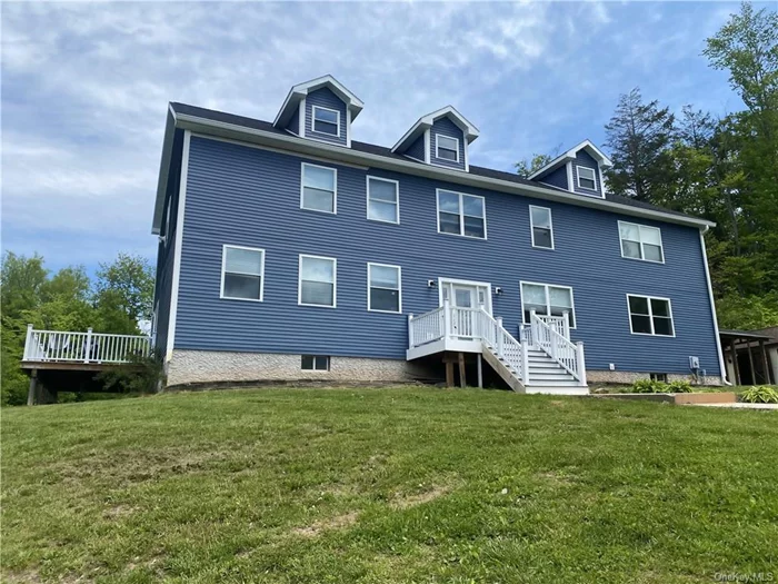 MOTIVATED SELLERS!! Bring Offers!! In 2022, this spacious Colonial home was completely renovated and remodeled with stunning features throughout. Basically everything inside and out, including flooring, windows, roof, siding, septic system and more new in 2022! Secluded on 3.1 acres with breathtaking panoramic year round mountain views. Whether outside on the front Treks deck, the side deck which wraps around to the back deck, or inside looking out the front of the house, you will be memorized by the stunning mountain views. Featuring a chef&rsquo;s kitchen including Maple wood cabinets, Quartz countertops, farm sink, LG Pro appliances and a large island with vegetable sink and dishwasher. With the french door refrigerator, the 5 burner gas stove and the double wall oven that also allows you to cook conventional, air fry or steam cook with Wifi control capabilities, you will be the talk of the town. Other features include hardwood floors, tile floors, central air conditioning, 6 Large bedrooms (2 of which are ensuites and one being turned into a home theater room), and a total of 5 bathrooms. The primary bedroom offers a spacious walk-in closet and a gorgeous bathroom with a floor-to-ceiling tiled shower, a porcelain soaking tub with jets and double vanity. This home has over 3500 sq ft with additional framed rooms in a heated full walkout basement. Outside Pergola set on pavers for outdoor entertaining and relaxation just off the large back deck. This home is designed with all the comforts of quality materials and products. Only minutes to the NYS Thruway Exit 21 and Ski Windham. 5 minutes to all amenities in the Town of Cairo and 15 Minutes to Catskill.