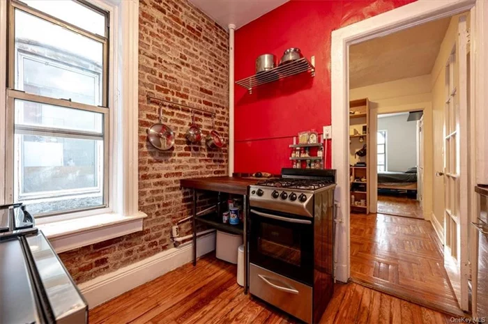 Welcome to this Upper east side gem. Full of old New York charm with exposed pre-war brick in all rooms, complemented by dark wood and warm colors. This extremely peaceful retreat is in the rear of the building, away from street noise, around the corner from the Q train and surrounded by grocery stores, bars, and popular restaurants and coffee shops.   This unit is a few blocks from Central Park nestled between the 1st Ave bike lane and public transportation, very good closet space and natural light to rise with in the mornings. It has been painstakingly restored and updated with details like custom-fitted hard-wood counters, built-in forever lighting, an oversized stainless steel sink, silent heating valves, and all modern fixtures.