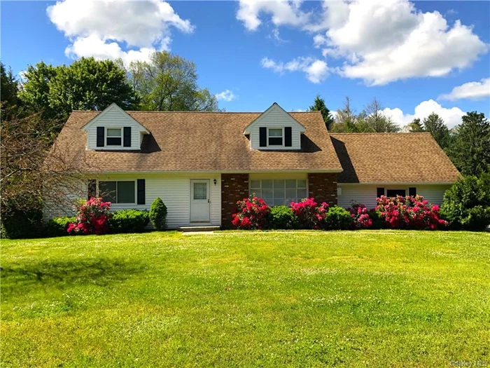 This beautiful Cape Cod home has been lovingly cared for by the same family for 50 years including new siding, roof and windows in 2017, new oil tank 2022, new oil burner in 2023. It features hardwood floors throughout, a poured concrete foundation, a full, dry, unfinished basement with Bilco door, a larger master bedroom on the first floor with a flex room next to it which could be configured into a first-floor master bedroom suite, first floor full bath and laundry, three bedrooms upstairs with another full bath. This park-like level acre property has an open backyard, waiting for your pool, garden and summertime barbeques enjoyed from the oversized deck. Located just minutes to the Village of Hopewell Junction and the Taconic Parkway. Municipal water and septic. Come see for yourself!