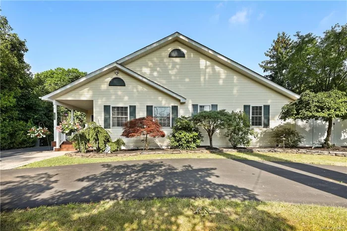 This wonderful ranch style residence in the sought-after Clarkstown School District offers the epitome of single-level living. This bright, spacious, and airy home boasts an open concept design that perfectly combines style and functionality. A great layout creates a seamless flow between the living, dining, and kitchen areas, ideal for both entertaining and everyday living. The heart of the home features a beautiful kitchen with stainless steel appliances, granite countertops, and a large center island. Vaulted ceilings and recessed lighting throughout this area enhance the sense of space and light while comfort is ensured year-round with central air conditioning, forced air heating and a wood-burning fireplace to add ambiance to the living area. The primary bedroom includes an ensuite bathroom, a walk-in closet and two additional standard closets while two additional bedrooms provide ample space for family or guests, serviced by a second full bathroom. The level fully fenced yard offers a charming paver patio with a retractable electric awning, perfect for outdoor dining and relaxation or you can simply enjoy morning coffee on the covered front porch complete with Trex decking. An oversized semi-circular driveway provides ample parking for multiple vehicles and is convenient when dropping off groceries. Conveniently located minutes away from both Rockland and Congers Lake with scenic parks and walking trails. Single level ranches are hard to come by so please do not miss this opportunity!
