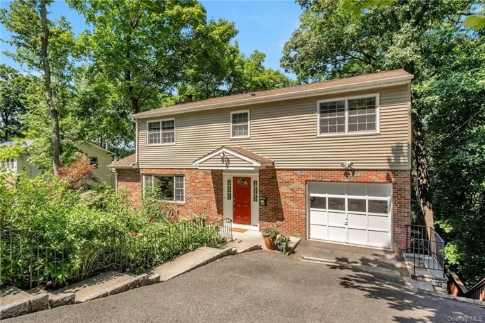 Welcome to this inviting 5 bedroom 3.5 bath home in Hastings. The open floor plan living and dining area with refreshed hardwood floors is perfect for socializing for intimate family or larger social gatherings. The renovated eat-in- kitchen offers a 6 burner WOLF stove and hood, new (2024) Miele dishwasher, new (2024) GE refrigerator and new (2022) microwave, granite counter tops and loads of storage. Sliders from the Dining Room open onto a lovely deck for morning coffee or an evening glass of wine with seasonal River views. Off the kitchen is a powder room and large pantry storage area. Second floor offers a large primary bedroom with an en suite bath with walk-in shower, and a walk in closet. There are 3 additional bedrooms and a hall bath to complete the floor as well as additional storage. Lower level offers an overly large and versatile family room with a multitude of possibilities One additional bedroom, an office and a full bath can be used for guests, au pair or in-law visits. The lower level also offers laundry area, utility room, and ample storage. From the family room sliders open onto two levels of decks, take your pick, games or outdoor dining. The fenced in backyard offers a level area for a play gym or additional seating area. This lovingly maintained home is a short walk to all Hastings schools, tennis courts and all that Hastings offers, from its charming village and farmer&rsquo;s markets to its top-rated schools and parks. The quick commute via Metro-North to NYC is an added bonus.