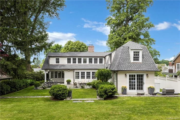 Incredible opportunity to rent this sun-filled, exquisitely renovated colonial located within walking distance to the bucolic Village of Bronxville and all that it has to offer, including award winning schools and an easy commute (28 minutes during peak hours) into Manhattan via Metro North. Charm abounds throughout this lovely house where elegant interior design blends perfectly with a beautifully landscaped, private back yard oasis. Featuring a first floor that flows easily between a family room with built-ins, home office with three exposures, picturesque living room with custom built-ins and a wood burning fireplace overlooking the property, gracious formal dining room, modern eat-in kitchen and pretty powder room. The second floor highlights an impressive primary with fabulous ensuite and large walk-in closet, three well-proportioned bedrooms, and two additional full bathrooms. The lower level has been thoughtfully renovated to incorporated a great recreation space as well as a mudroom and additional storage. A true gem!