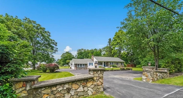 Enjoy one-level living in this beautifully renovated ranch-style home. The large kitchen sparkles with high-end finishes and is adorned with such touches as a large farmhouse sink, microwave drawer, pot filler & stainless appliances ..+ radiant heated floors in kitchen and bathroom. Offering plenty of room for everyone to be together, the open floorplan is defined by a beautiful stone hearth with a wood-burning fireplace. Potential guest suite off the family room is especially noteworthy and boasts a full bath and separate entrance and parking via its own driveway entry from Nina Street. Set on a one-acre corner lot, the level backyard sports a large stamped concrete patio. This is a wonderful home with perfect potential for multi-generational living.