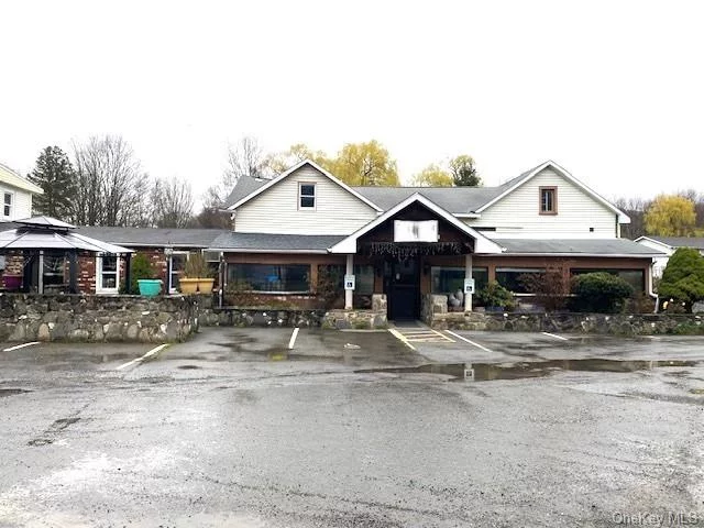 This unit is ideally located in high traffic area for residents & tourists! Across from a top-rated family resort, approximately 3 miles from the quaint hamlet of Highland, this 2, 100 sq. ft. space is available to lease. Previously leased as a restaurant, this space has numerous usages allowed. has ample parking and visibility. This unit is situated next to a cafe and has endless opportunities!