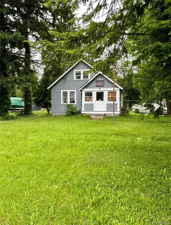 Unlock the potential of this diamond in the rough, perfect for first-time homebuyers looking to fix and make it their own. Flipper? This property offers a versatile investment opportunity to buy and resell, rent it out, or transform it into your dream home. Boasting classic hardwood floors, this house is brimming with character and charm. 2 bedrooms on the main floor and a walkup attic for additional living space. While it requires several updates, including the kitchen and heating system, the end result promises to be spectacular. Sitting on over 1 acre of property and featuring a detached garage, there&rsquo;s ample space and potential for expansion or customization. Don&rsquo;t miss out on this incredible chance to create something truly special! Selling as is.