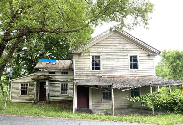 Looking for a lover of history to preserve and rehab this historic structure which was an integral part of Ancram&rsquo;s storied past. The Tinsmith House was built in the 19th century and served as the location of the local tinsmith shop as well as a general store and a residence. The structure sits at the crossroads of Route 82 and County Route 7 in the historic Ancram hamlet. The property requires a total rehab and is not currently habitable.