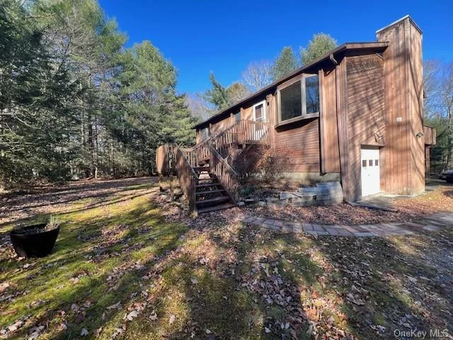 Nestled in the picturesque landscape of Glen Spey, New York, this enchanting property offers a serene retreat on 5.12 acres. The gentle flow of water, sit by your own pond and warm evenings with a fire pit and watch the starlights or the rustle of leaves, and the occasional chirp of a bird in your ear! As you drive up the private, tree-lined driveway, you&rsquo;ll be greeted by the peaceful ambiance and natural beauty that surrounds this countryside haven. The property boasts expansive lawns, mature trees, and abundant greenery, providing a sense of privacy and seclusion. The main residence exudes rustic charm and elegance, featuring a blend of traditional and modern elements. With spacious living areas, including a cozy living room with a stone fireplace,  and multiple bedrooms and bathrooms, this home offers both comfort and functionality. Large windows throughout the house frame picturesque views of the surrounding countryside, allowing natural light to flood the interior spaces. Step outside onto the expansive deck or patio area, where you can unwind and soak in the peaceful atmosphere while enjoying the sights and sounds of nature. The property also includes a two vehicle garage and ample parking space, perfect for accommodating guests or storing outdoor equipment. Surrounded by acres of untouched wilderness, this property offers endless opportunities for outdoor recreation and exploration. Whether you enjoy hiking, fishing, or simply taking leisurely strolls through nature, there&rsquo;s something for everyone to enjoy right at your doorstep. Located just a short drive from the charming town of Glen Spey, you&rsquo;ll have convenient access to local amenities, Bethel Woods, fresh markets, including shops, restaurants, and recreational facilities. Additionally, the property is within easy reach of the Delaware River, known for its world-class fishing and scenic beauty. Escape the hustle and bustle of city life and experience the tranquility of country living at this exceptional property in Glen Spey, NY. Don&rsquo;t miss your chance to make this your own private sanctuary. Schedule to preview today!