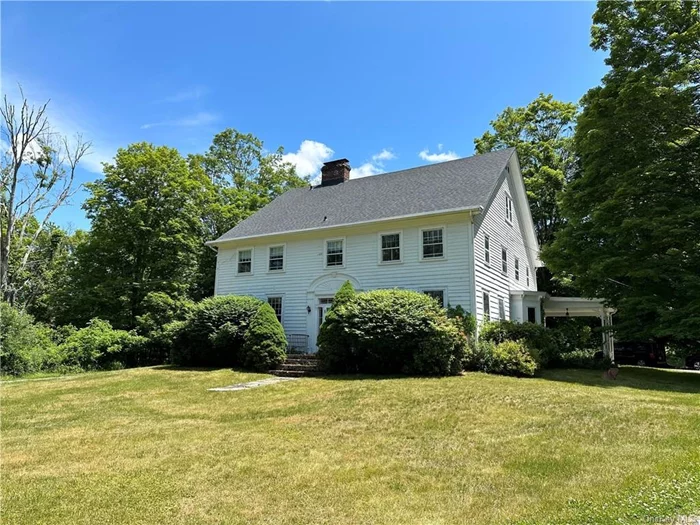 A very special offering. Privately set and located down a tree lined drive, is this stately 19th century Colonial on 41.7 acres. The first floor consists of a center hall from front to back, double parlor with fireplace, spacious kitchen, formal dining room with fireplace, and a half bath. The second floors has four bedrooms, two with fireplaces, and two bathrooms. There is a large third floor space with a full bath, perfect for working from home or a studio space. This home of 4, 289 square feet offers nice moldings, hardwood floors and spacious rooms throughout. There is a large barn complex. The property consists of woodlands, a pond, and four open fields which are ideal for horses or livestock. Located in the heart of Stanfordville zoned as Rural Center (RC) and centrally located between Rhinebeck and Millbrook.