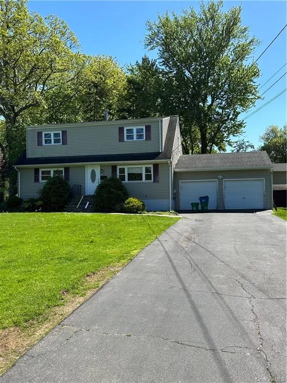 Spacious 4 bedroom 2 full bath rental in Clarkstown Schools. Many updates including kitchen and baths. Lots of storage and closet space. Full finished basement with multiple rooms. Washer and Dryer included. Covered deck, and great yard with patio. You will love the neighborhood. Close to town, restaurants and shopping.