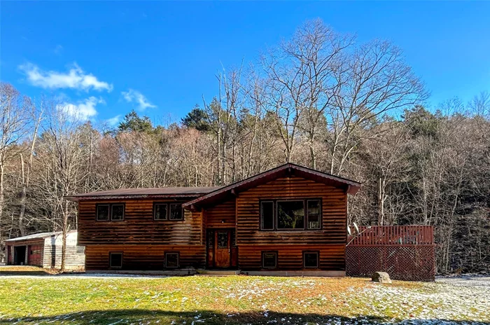 If peace and tranquility are what you&rsquo;re looking for than look no further than the Catskill Mountains and this gem of a home in the sleepy town of Grahamsville. This bi-level has four spacious bedrooms, generous living room with original wood features, rear deck, formal dining room, large family room, ample storage, two car garage and more. You&rsquo;ll enjoy low taxes, the privacy of rural living, a tranquil stream along the property line, and a modest parcel of land. Schedule your private appointment today!