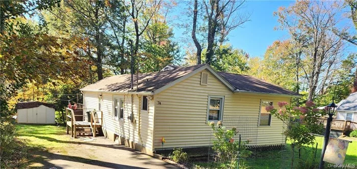 Sweet Smallwood 3 season cottage is now on the market. Considerable eat in kitchen has plenty of cabinets, gas stove and ample countertop space for large family meals. Plenty of social gathering space in the living room and a newly added spectacular family room perfect for movie nights with gorgeous, warming, propane fireplace. Step out onto wrap around deck for sunrise coffee or sunset cocktails. Grassy knoll can be fenced to create a private outdoor firepit lounge. Newer windows, wood floors and roof that is 7 years old. Be part of the Smallwood lake community with a sandy beach, non-motor boating, fishing, outdoor sports court, walking trails near the waterfall, outdoor exercise equipment and dog park. The Club at Smallwood has heated pool with daily and nightly activities. The amenities and adventures are abundant. Nearby Bethel Woods, Resorts World Catskill Casino, Kartrite Waterpark, lakefront dining, festivals and farmers markets. Visit the lakes, mountains and rivers. Own a piece of the Catskills. Call to take the tour.