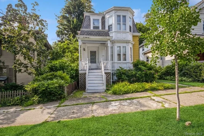 This Victorian Italianate home is located in the historic district of Cold Spring, and the very heart of town. It is within walking distance of restaurants, library, school, and train, yet has one of the most peaceful views in town - a lovely view of a large and sweeping lawn across the street. Built in 1870, it was purchased and expanded by George W. Mosher in 1890, and has been in his family since. The home has front and side porches and boasts 9 rooms on three floors (plus 2 and a half bathrooms, large closet room upstairsformer nursery, and hall. ) (1800 sq. feet) The remodeled main floor kitchen has a stackable laundry unit and access to the side porch. The home sits on a 35&rsquo; x 100&rsquo; lot, with room for off- street parking, and has an adjacent lot that extends in L -shaped fashion to Morris Ave. The finished basement (original kitchen and dining room) offers the possibility of an in-law suite.