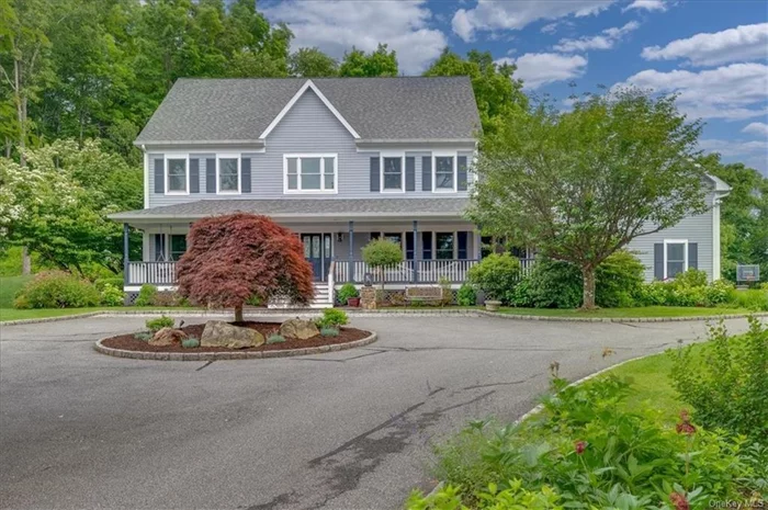 Nestled at the end of a tranquil cul-de-sac in coveted Salmon Daily Brook Farm, 15 N Hollow Road is enveloped by mature plantings, a ball-field size lawn and serene forestry, imparting a profound sense of privacy and elegance. Inside this grand center hall colonial boasts a sub-zero fridge in its oversized kitchen, four living room areas, a dedicated office, formal dining room, laundry room, and gym. Two bedrooms share a hall bathroom, while the third hall bedroom includes an en suite bath. The Primary Suite, flooded with natural light, overlooks the backyard gardens and includes a sitting room, changing area, and walk-in closets. The Great Room above the garage is the fifth bedroom. The three-car garage includes ample storage, a work bench and utility sink. Minutes to major highways, shopping and schools. Convenient drive to the Metro North.