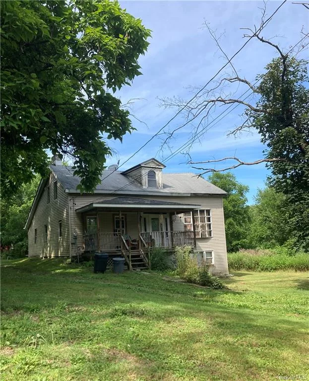 Sitting above the shores of the Wallkill River, you&rsquo;ll delight in the sound of rushing water. The land was previously mowed right to the shoreline, this is easy to attain again. Take a stroll down the existing path which brings you to the rivers edge when you visit the property, and see for yourself! As you relax along the shore, you will be in awe watching the eagles fish and the deer quench their thirst by the shore! Mature Walnut, Maple and Catalpa trees dot the landscape. The setting is magical! There are a variety of out buildings on the property as were typical of the period. A chicken coop, barn and stable with 3 stalls. About 20 years ago the field was fenced and horses grazed on the north-western corner of the land. So bring the Horses, Goats or Llamas! The variety of outbuildings allow plenty of room for storage, hobbies or perhaps &rsquo;weekend farmer&rsquo;. The house needs complete rehabilitation, you can tell from the pictures. Seller will not entertain offers with financing. Motivated seller. With the right vision and desire, &rsquo;&rsquo;The Millers House&rsquo;&rsquo; might become a new showplace on the shores of the Wallkill. A HOLD HARMLESS DISCLOSURE is required before a showing request is confirmed. Wallkill River frontage is hard to come by, and this property has been in the family for decades. The location is superb! Within 20 minutes to NYS Thruway exit 17, Stewart International Airport, Metro-North. Adventures await at Minnewaska State Park, Mohonk Preserve or Blue Sky Ranch. For the Foodie in you, wineries, breweries and Farm to Table locations serve yummy offerings and fun music. So, if you are looking to revive a slice of history, on a magical setting, in a convenient location, come take a look!