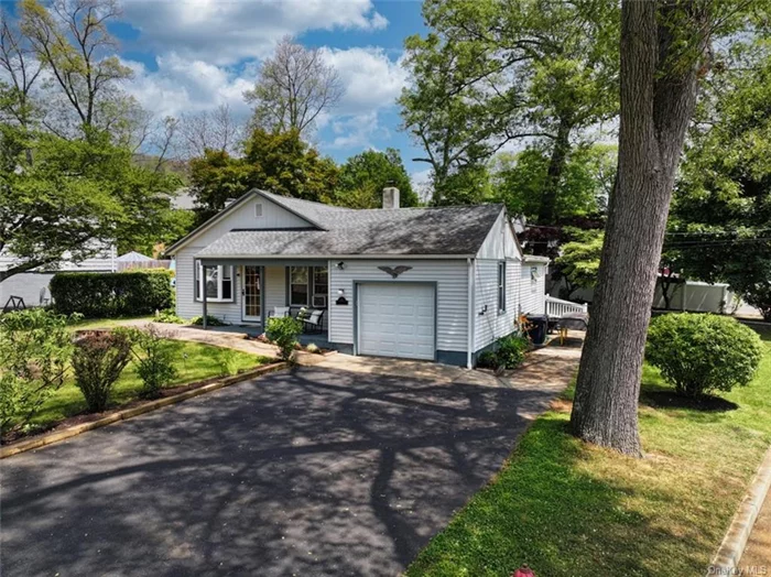 This adorable 3 bedroom, 2 bath ranch home sits on a perfectly landscaped corner lot. It is truly a must see with so many possibilities for additional living space including an enclosed porch/sunroom right off the kitchen, not represented in the listed square footage, that overlooks the private backyard. There is also an abundance of storage space in the stand-up attic. Beautiful hardwood floors and a wood-burning fireplace in the living room add to its charm. The fully fenced-in backyard has a shed with a new roof, and there are multiple patio areas for grilling, a firepit, or relaxing. There&rsquo;s even enough room to add a pool for your summer time fun. In a lovely, peaceful neighborhood and ideally located to the town amenities as well as all of the activities the Hudson Valley has to offer. Enjoy apple and pumpkin picking, wineries, hiking, restaurants, and so much more. Minutes from West Point, Bear Mountain State Park, and multiple train stations to New York City.