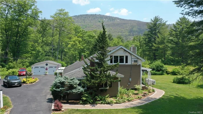 Quiet, serene Country Cottage perfectly situated on 11+ acres of unobstructed mountain views, small pond, nature paradise. Enjoy the outside from any setting and be captivated by the sounds and sites of nature around you.  Only 90 minutes from NYC, this bucolic setting awaits you and be away from it all.  Master suite on 2nd floor, all natural woodwork throughout, wide planking, vaulted ceilings, with some of the yesteryear charm. 2 bedrooms on main floor potential, 2 full baths, custom granite kitchen, and plenty of outdoor sitting areas.  Well constructed, mechanicals all updated, private, generator, radiant heat in main living area, perfect for getaway or year-round residence.  2 outbuildings for storage and garage use, hobbyist or outdoor enthusiast. Property abutts the D&H canal, rich with history