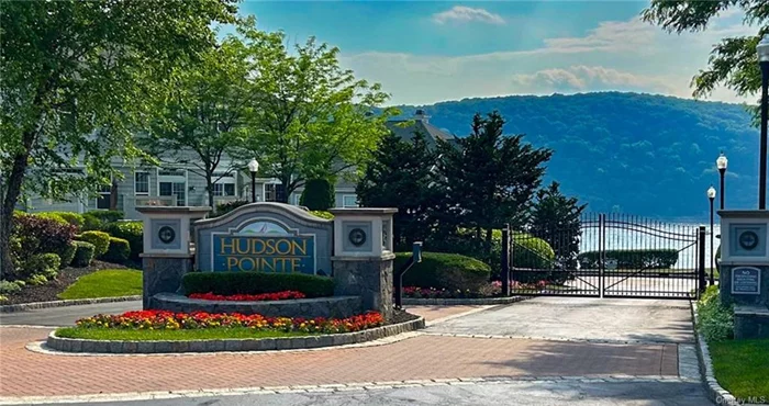 Experience luxury living in this fully renovated 2 bedroom, 2.5 bath condo located in the highly sought-after Hudson Pointe community. This exquisite home offers panoramic views of the Hudson River, the surrounding mountains, and the Mid-Hudson Bridge.  The main level boasts an open-concept design featuring a chef&rsquo;s kitchen with stainless steel appliances, a spacious living and dining area with a marble gas fireplace, and glass sliders leading to a deck with breathtaking river views. The lower level has a separate laundry room and half bath, family room, and separate storage/utility area as well as a second deck with amazing views.  On the second level, there&rsquo;s a guest room and full bath with a jetted tub/shower, a primary bedroom suite with vaulted ceilings, a walk-in closet, and an en suite bathroom featuring double sinks and a 7ft double headed stone and marble shower. The third story loft is a versatile space with a large walk-in closet/dressing area, perfect as a possible third bedroom or office space.  Enjoy excellent amenities including a gated entry, a clubhouse with a fitness center, and heated in-ground pool. Conveniently located to Route 9, Metro North, Vassar Hospital, and the Mid-Hudson Bridge. Don&rsquo;t miss out on this rare opportunity to own a piece of paradise with unmatched views and luxurious finishes.