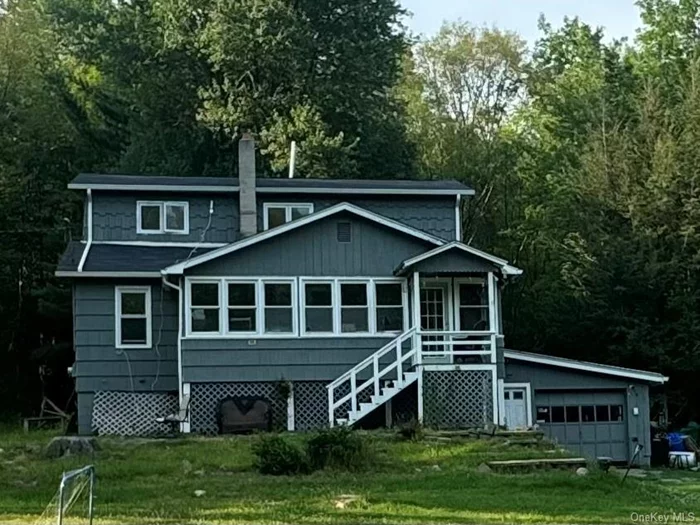 Charming Single-Family Home on 2 Acres in Sullivan County, NY  Welcome to your serene retreat in the heart of Sullivan County! This charming single-family home, nestled on a spacious 2-acre lot, offers the perfect blend of rustic tranquility and modern convenience. With three bedrooms, one bath, and move-in-ready condition, this property is an ideal sanctuary for families, weekend getaways, or those seeking a peaceful lifestyle within easy reach of New York City.  Property Features:  Spacious Living: This lovely home boasts a well-designed layout with three comfortable bedrooms and one full bathroom. The cozy living spaces are perfect for relaxing and entertaining, providing a warm and inviting atmosphere.  Recent Upgrades: The roof is less than 5 years old, providing peace of mind and long-term durability. Additionally, the gutters have been upgraded and are only 1 year old, ensuring efficient drainage and protection for your home.  Expansive Lot: Set on 2 acres of picturesque land, this property offers ample space for outdoor activities, gardening, or simply enjoying nature. The expansive yard provides endless possibilities for creating your dream outdoor oasis.  Convenient Location: Just 1.5 hours from New York City, this home offers the perfect balance of rural living and urban accessibility. Enjoy the tranquility of country life while being a short drive away from the vibrant city.  Charming Details: The home features a classic, rustic charm with modern touches. Hardwood floors, large windows, and tasteful finishes throughout add to the home&rsquo;s appeal.  Proximity to Nature: Sullivan County is known for its beautiful landscapes and outdoor recreation opportunities. Enjoy nearby hiking trails, fishing spots, and scenic drives, making it a perfect location for nature enthusiasts.  Don&rsquo;t miss this rare opportunity to own a charming single-family home on 2 acres in the picturesque Sullivan County. Experience the peace and beauty of country living with the convenience of being close to the city. Schedule a private viewing today and make this delightful home yours!