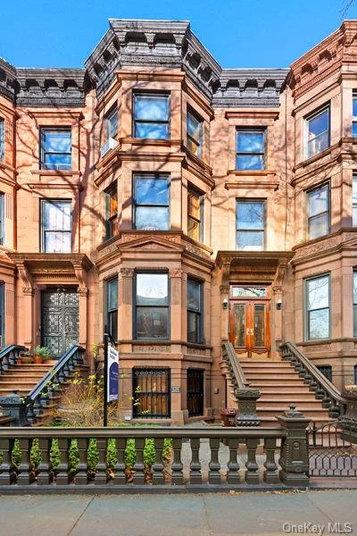 Located on a beautiful tree-lined townhouse block in the heart of Park Slope, 769 Carroll Street is a stately, 20&rsquo;-wide historic townhome. Built in 1885, this historic building features nearly 4, 300 square feet across four levels and is currently configured as four renovated floor-through apartments. Number 769 has been miraculously maintained and each unit features Northern and Southern exposures, restored period detail, and excellent ceiling heights. Throughout the home, charming original details include parquet floors, eight mantels, moldings, doors, and banister. The grand stoop entry leads past a striking brownstone facade into a spacious vestibule. Oversized doors lead directly into the parlor apartment featuring soaring 12&rsquo; ceilings. A large living space is located to the front overlooking Carroll Street and the kitchen and dining space centrally located. To the rear of this level, a full-width bedroom features original built-in storage and three windows overlooking the charming rear garden. Downstairs, the garden floor apartment is configured with the living, dining, and kitchen to the front with the bedroom and bathroom located to the rear. This level also features a small extension that could easily function as an office or large walk-in closet. The garden is accessible through this level as well. Below, the finished cellar provides additional living space that could function as tenant storage. The third and fourth floors are each configured with two bedrooms and one full bathroom. Each features a full-width living space to the South allowing light to pour in. 769 Carroll Street is steps from Prospect Park, historic Grand Army Plaza, and the Union Street and 7th Avenue subway stations, offering convenient access to all of Brooklyn and Manhattan. Additionally, the boutique shops, cafes, and restaurants of 5th and 7th Avenues are only steps away. This incredibly well maintained townhome offers unparalleled value and convenience in prime Park Slope.