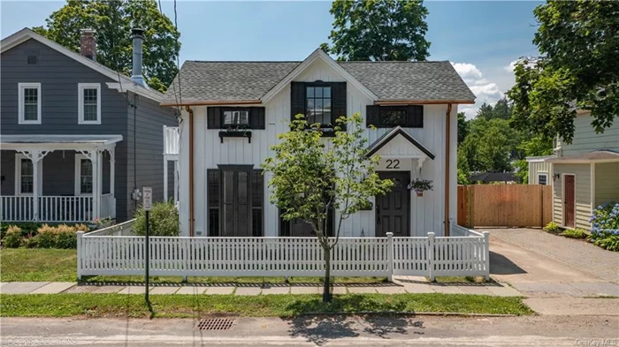 Nestled in the heart of Rhinebeck Village, this charming c1840s Historic Carpenter Gothic-style home epitomizes modern comfort while retaining its timeless allure. Renovated in 2024, the residence seamlessly blends historic charm with contemporary amenities, offering a perfect balance of past and present. Step through the private back gate directly into the pulse of the vibrant village, where the weekly farmers&rsquo; market, quaint shops, and inviting restaurants await. Upon entry, a spacious foyer welcomes you, leading to a gourmet kitchen that sets the stage for culinary adventures, featuring beautiful, soft white cabinetry, modern fixtures, stainless appliances and a generous island counter with seating . Original wide-plank floors, lovingly preserved from the home&rsquo;s 185-year history, add warmth and character to each room on the main level. French doors, a hallmark of the era, grace both the living room and one of the bedrooms, connecting interiors with the picturesque surroundings. The dining room flows gracefully into the living room, creating a fluid space adaptable to intimate gatherings or larger soir es. Two remodeled bathrooms, one on each floor, boast modern fixtures while maintaining a nod to the home&rsquo;s heritage. Upstairs, the primary bedroom offers high ceilings and lots of windows showcasing beautiful views of the village. Completing the upper level are two additional bedrooms and a fourth versatile room, ideal for an office, hobbies, or guests. Every detail has been meticulously considered, from the brand-new Marvin windows, updated electric, new plumbing and blown-in insulation to the freshly installed roof, ensuring efficiency and comfort. Outside, a serene back patio overlooks a fenced-in yard, complete with a separate 350 square-foot multi-purpose Amish-built shed with electric heat and a/c - perfect for and number of creative pursuits. In essence, this impeccably updated residence not only honors its storied past but also embraces the conveniences and style of contemporary living a rare blend where history meets modernity in perfect harmony.