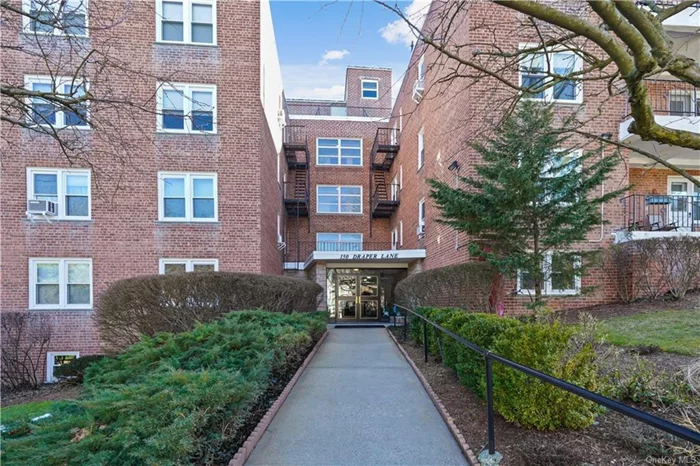 Comfortable living in downtown Dobbs Ferry! Walk to Metro North Train Station and stroll the streets lined with specialty shops. The apartment boasts a large living room that leads out to a covered balcony. The primary bedroom, with plenty of closet space, is oversized and can easily fit a king size bed. The second bedroom is steps away from the updated bathroom. Dining area is large enough for you to host dinner gatherings. The galley kitchen has updated appliances. You will call Draper Lane, this well-maintained cooperative building, your new home. There is additional unassigned parking spaces behind the building. Call for an appointment to see it today. a/o continue to show.....