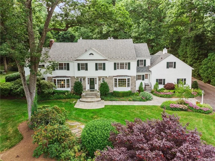 An exquisite Colonial nestled on 1.65 acres of wildly-pretty English country gardens in the heart of esteemed Sterling Ridge estate area. Pure privacy, set back from the road behind park-like trees, with fenced heated pool, sun-dappled patio and blooms of every color. A peaceful retreat where the only sound is birdsong! At the heart of this immaculate home is a designer kitchen that welcomes alfresco living. A chef&rsquo;s delight it features a large island with seating, butler&rsquo;s pantry/wet-bar with 2nd dishwasher, and sunny breakfast area with walls of glass opening to the patio and built-in grill. Every space is crafted with elegant moldings, bay windows and rich oak floors. From the bright, airy family & living rooms that open poolside, to the grand cherry paneled library to the chic dining room and mudroom leading to 2-car garage. The 2nd floor is quiet bliss, with stunning primary & ensuite spa bath plus a vast walk-in-closet room, plus 2 more beds and hall bath and 2 ensuite bedrooms.