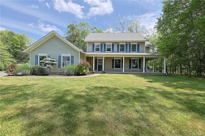 Discover a unique property nestled in the Town of Wawayanda, within the Minisink Valley School District. This colonial-style main house, constructed in 1994, features a charming wraparound rocking chair porch front porch. The residence is set on 2.1 acres, accompanied by a 40 x 250 barn built in 1960, currently serving as storage. This structure is equipped with electricity and offers limitless potential. The home itself is a harmonious blend of comfort, spaciousness, and natural allure. The ground floor includes a family room with a welcoming fireplace, leading into a sizable kitchen, alongside a dining room, formal living room, half bath, pantry, and a mudroom with laundry facilities. Upstairs, the bedrooms boast generous closet space, with the primary bedroom offering a private bath, walk-in closet, and an additional storage closet. Three more bedrooms and another full bath complete this level. The walk-up attic presents a blank canvas for your creativity, and the expansive unfinished basement holds possibilities for a game room, gym, or media center. Its prime location delivers a rural ambiance without sacrificing convenience to shopping, major highways, and commuter routes. Proximity to schools, shopping centers, highways, town parks, dining, The Heritage Trail, High Point New Jersey, Legoland, and more, makes it an ideal commuter distance to NYC. Seize the chance to make this idyllic setting and stunning home yours.