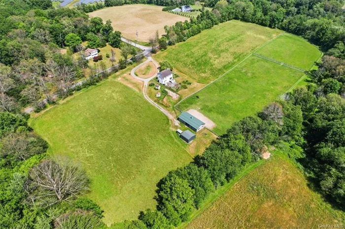 Terrific horse property with subdivision possibilities (1, 000+ feet road frontage). Lovely 3 bedroom/3 bathroom side colonial set on 44.12 acres with open fields (hayed yearly) perfect for an outdoor, indoor or both; Morton barn with 2-12x12 and 2-12x14 rubber matted stalls, electric, water, run-in to turnout; 2 large, connected turnouts; outbuildings/sheds; mature gardens. This charming and comfortable home features hardwood floors, woodburning fireplace, plenty of windows, a dining area open to the kitchen with sliders to the deck and gardens, a kitchen large enough to cook for a crowd, laundry closet off the kitchen, tiled bath with stand-up shower on first level. Upstairs, the Master bedroom is quite spacious and can easily fit large furniture. It has an expansive closet, and the en suite features a soaking tub for relaxation. The second bedroom flaunts scads of closet space and lovely custom built-in bookcases. The third bedroom is roomy with a large closet and center light/fan. Imagine sitting on your deck admiring the view of your horses in your own backyard! This property is on a quiet road and commutable to HITS Saugerties, many area A and schooling shows, as well as great trails at Stewart State Forest, Minnewaska, Mohonk, and some local spots. It&rsquo;s close to many outstanding area restaurants, shopping, the wine trail, and plenty of world-class outdoor recreation. Bring your horses home!