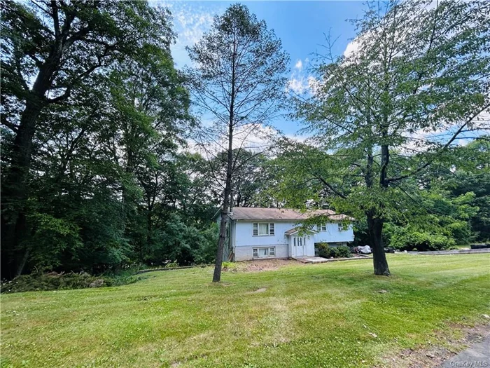 Expansive property with 228 ft frontage on almost .60 acres of land. Bi-level with 4 bedrooms and 2.5 bathrooms. Property has access from front and from back on Clubview Rd.