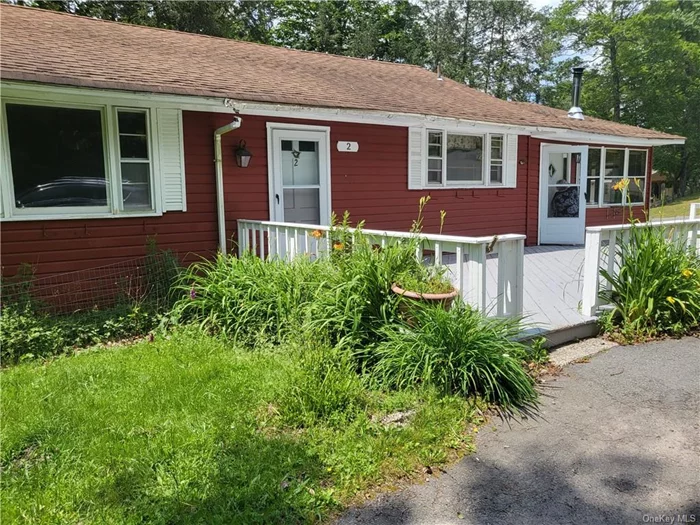 Nice corner lot, 2 Bedrooms 2 Bath and playroom. Large front deck room for family fun. Access to Melody Lake for boating and beach, close to shopping, schools, ski hill and casino. Just needs TLC        OFFER ACCEPTED