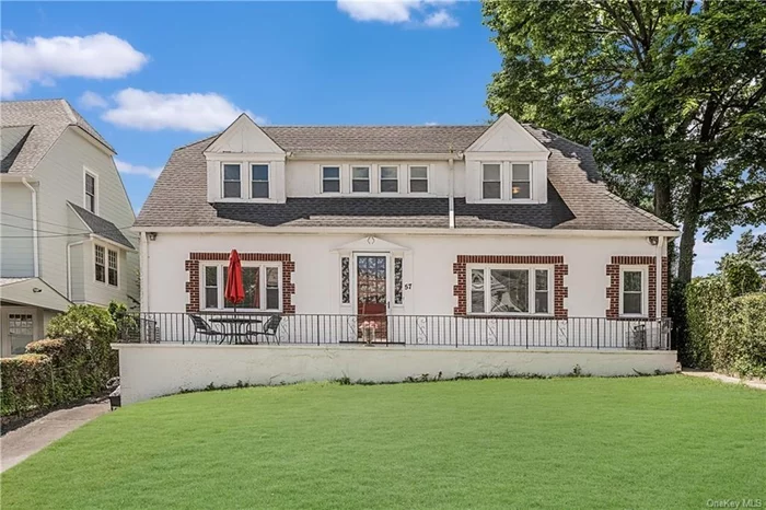 AGELESS-UPDATED COLONIAL! Perched on a hill in Southwest Yonkers, this 1904 Center Hall Colonial masterfully blends historic charm with modern comfort. This timeless beauty on the Riverdale border offers a perfect setting for serene living near the city. The first floor features an entertainment-sized living room overlooking the front lawn and tree-lined street, a formal dining room with French doors, a large patio for al fresco dining, and a chef&rsquo;s kitchen with stainless steel appliances, granite countertops, and custom wood cabinetry. There are two bedrooms and a luxurious guest bathroom off the entry foyer. Upstairs, the large main bedroom has two exposures and a walk-in closet. Two other bedrooms and a sleek renovated bathroom complete the second floor. The Garage has an upstairs one bedroom apt or home office with a full bathroom and kitchen area not included in the square footage. The plumbing is not currently operational. It needs work but has great potential for a home office or extra space for guests. Close to Riverdale Metro North station, MTA local and express buses, Van Cortlandt Park, Wave Hill, shopping and restaurants. Don&rsquo;t miss the opportunity to own this charming and updated Colonial in Southwest Yonkers! Call today!