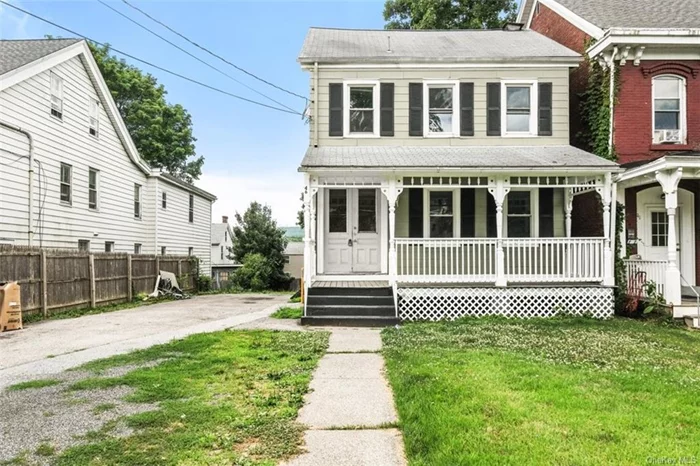 Fresh, clean, beautiful. This 4 Bedroom 2 Full bath Colonial sits on a great big lot and is minutes to Route 9 by Marist college. Move in ready with new white cabinets and butcher block counters, freshly painted, new flooring, new stainless-steel appliances. An Exceptionally nice feature is a large sunroom on the first floor which connects to a small porch to the back yard. I can see this as the preferred room in the summer. There is also a one bedroom and a full bath on the first level which makes it comfortable if stairs don&rsquo;t work for you. The 2nd floor consists of 3 Bedrooms a full bath and walk-up attic. This lot is completely level with enough parking for 6 to 8 cars. This is a wonderful City home in a great location.