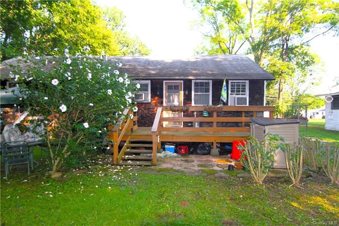 Find your getaway! Located in the beautiful Hudson Valley, this oversized 1 Bed, 2 full bath half duplex cabin on Sylvan Lake boasts cedar shake siding, updated electrical and plumbing, dine in kitchen with pantry, 2 updated full baths, cathedral ceilings and loft attic space. Master bed with separate egress to yard area for you to have your morning coffee or take in the breeze off the lake! Home sold with existing furniture. Somerset Leisure Homes is a private season home community featuring a playground, basketball court, volleyball laundry on premises and a pavillion/entertainment area. Direct private access to Sylvan Lake with boating/dock area and beach allow for fishing, canoeing, kayaking and swimming. Nearby amenities include the Hudson River, Walkway over the Hudson, the Rail Trail, Appalachian trail, vineyards, fairgrounds, shopping and restaurants. PLEASE NOTE: MAINTAINED FROM APRIL - OCTOBER, BUT ACCESSIBLE YEAR-ROUND. THE MAIN WATER IS SHUT OFF DURING THE WINTER MONTHS.