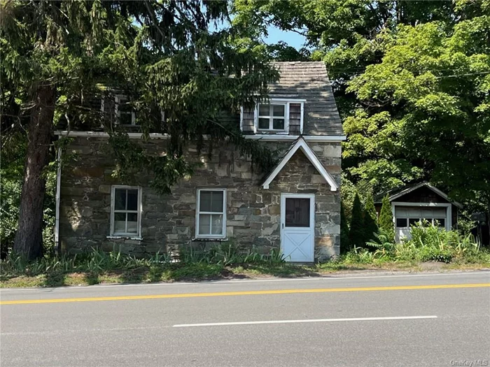 Checkout this very unique move in ready home today. This Benjamin Woodruff Home is estimated to have been built in 1790. Built with local rock with thick walls. Because of that the windows have a unique set in with wide & deep sills. Your pets will love to lay in the sun on them. Mostly has the original floors. Nice size kitchen with lots of counter space. Convenient dining area with fireplace for easy serving of meals. Very comfortable living room with fireplace & those great windows! Large first floor bedroom and bathroom. On the second floor there are three bedrooms. The one bedroom could be your home office. A full bathroom rounds out the second floor. In the back of the home with a park like private back yard with many different kinds of flowering bushes and perennials. A one car garage which needs some work. New furnace 2023, roof & gutters 2024. Close to all of your shopping needs, major highways, bus, and train connections! This truly unique home is priced to sell quickly.