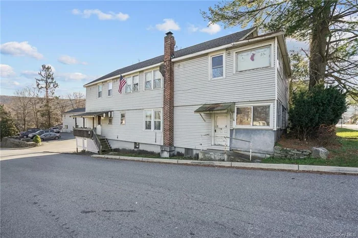 Affordable one-bedroom apartment, located in beautiful and historic Fort Montgomery! Conveniently located near Route 9W and the Palisades Interstate Parkway makes 4 Montgomery a perfect home location for a commuter! This sweet second floor end-unit features one spacious bedroom, full bath, large living room, full eat-in kitchen, upstairs storage space.. Bright, airy, immaculate! Enjoy private deck, common grounds and lot parking. Easily accessible coin operated laundry on site. Landlord pays heat, hot water, water, sewer, trash collection and lawn maintenance.  Tenant responsible for electric, cable, phone and internet.  NYC less than 50 miles.  Metro North train service available at Garrison or Peekskill. West Point minutes away.  Woodbury Common Premium Outlets only 13 miles. Available September 1, 2024!