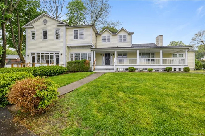 This gorgeous farmhouse colonial offers countless options for a variety of lifestyles. A charming lemonade porch greets you. Enter to the 2-story foyer of the main home. Just beyond the beautiful staircase you&rsquo;ll find a convenient downstairs bedroom with half bath. To the left of the foyer is the eat-in kitchen. This cook&rsquo;s paradise consists of endless counter space, ample cabinet and pantry storage, and modern appliances. The breakfast nook is surrounded by picture windows and elegant French doors spilling out to the porch. This area extends towards the formal dining room, with another set of elegant doors leading to the front patio. From the dining room, step down to the formal living room and enjoy the inviting fireplace. The second floor has three bedrooms including a luxurious master suite with a vaulted ceiling and private bathroom with jacuzzi tub. A second full bath and a convenient laundry room can also be found on this level. The massive basement offers over 600 square feet of additional space that can be transformed into a playroom, fitness area, media room and more. This special home also features a private, two bedroom, two bath guest suite. The entrance can be found on the right side of the home and includes its own driveway. Here you will find an open concept living room and kitchen layout, with an adjacent formal living room. One lovely bedroom and full bath is located on the first level, and a primary bedroom with bath and walk-in closet is on the second level. The home sits on a generously sized lot, with quick access to downtown Stony Point shops and restaurants, the bay and marina, parks, highways, and more.