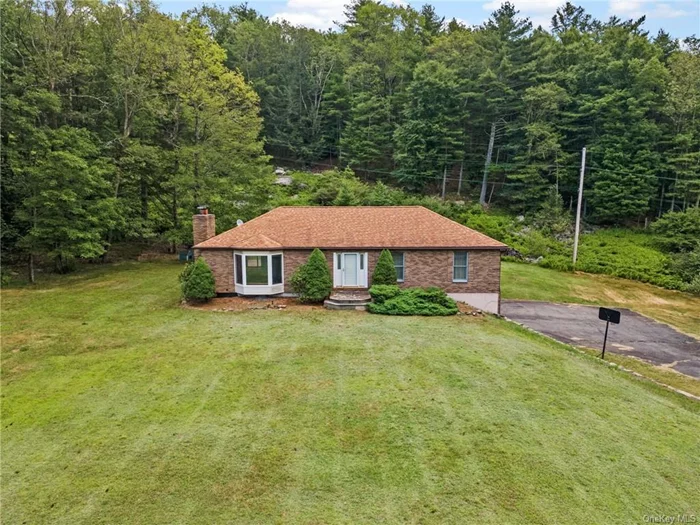 Welcome to this charming single family home on over one acre of scenic land. This property is the perfect blend of comfort, privacy, and outdoor space. The inviting living area is flooded with natural light and features a cozy fireplace, the well-appointed kitchen offers modern appliances with ample counter space and storage. The primary bedroom features its own private bathrooms, and the two remaining bedrooms provide flexibility for guests, family, or a home office. Step outside and enjoy the expansive yard, offering endless possibilities for outdoor activities and creating lasting memories. Don&rsquo;t miss out on this opportunity to own this beautiful home on a generous lot!