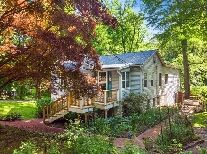 Discover serenity at your next home at 19 Hollowbrook Lane in Cortland Manor! Charm and modern comforts converge in this delightful cottage-style home boasting 3 bedrooms and 3 full bathrooms across 1, 350 square feet. Offering a valuable blend of tranquility and practicality this home is tucked away in a lovely neighborhood only 10 minutes away from everything (shopping, parks, golf, schools). But when you are here, you feel far away from it all! Exterior features of this home include a new roof down to the plywood in 2020, new gutters and gutter guards installed in 2019, and easy to maintain vinyl siding power washed just this past June. For the flower and garden enthusiast, walk down the charming brick pathways and enjoy the sights and scents of Hydrangeas, Hosta, Goatsbeard, Balloon flowers, Peonies, Daffodils, Asters and Lilies that surround the house and leads you to the large 660 square foot deck overlooking the brook. A picture perfect place to enjoy your morning coffee or host gatherings amidst nature&rsquo;s embrace. Come inside the front door and be greeted by a lovely living room with wood burning fireplace. This leads to the kitchen with many updates including Quartz countertops, a new GE Stove with built in Air Fryer in 2022, a new Microwave in 2023, a new Kitchen Aid Refrigerator in 2017, and a GE Profile Dishwasher from 2008. This level also features 2 bedrooms and 2 bathrooms. With a separate entrance to the lower level that offers a bedroom and full bathroom, the lower level is perfect space for those who need additional but separate living area. In the basement is also the updated boiler in 2014 and the above-ground oil tanks. 19 Hollowbrook Lane has so much to offer it&rsquo;s next owner ready to put their personal touches on this home. Don&rsquo;t miss the opportunity to make this cottage-style gem your own. Schedule a showing today and envision the possibilities awaiting you at 19 Hollowbrook Lane. Please note, the Dryer is functional but does shut off prematurely during operation. The Dryer is being sold as is. The Shed is being sold as is.