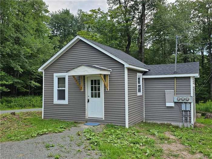 Delightful 1-bedroom, 1-bathroom home, offering a perfect blend of privacy in a country setting. This single-level living space features hardwood floors throughout, creating a warm and manageable living space. Off street parking. Rent includes water and sewer. Tenant pays electric/heating/cooling, garbage, lawn/snow removal.