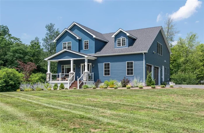 Welcome to this stunning 4-bed, 4.5-bath home on 2.2 acres at the end of a tranquil cul-de-sac near Rhinebeck Village. Built in 2022, this 3, 518 square foot residence boasts modern elegance and comfort. A gourmet kitchen with top of the line appliances opens to a cozy breakfast nook. The living room features a fireplace and large windows with serene views. The primary suite offers a spa-like ensuite bathroom. Three additional bedrooms each have private or shared bathrooms. Outdoor living includes a spacious deck overlooking lush greenery. The expansive 2.2-acre lot allows for gardening and outdoor activities. Located near shops, restaurants, and cultural attractions, this home blends luxury with countryside living. Minutes to Amtrak for easy access to and from NYC.