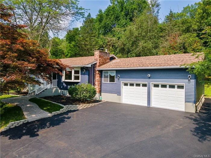 You&rsquo;re going to love the quiet living in this lovely home! It will give you peace of mind, with all new features! New blue siding makes it the most striking home in the neighborhood+ new roof! Stamped concrete walkway & new entry lead you in. Gorgeous kitchen has quartz counters, stylish cabinets, modern lighting, new appliances, pantry and an island with a breakfast bar! The open floor design allows you to easily change around your living space! The living room has a brick fireplace and a Pella Bay window with built in blinds! plus there&rsquo;s a sunken family room with sliders to the beautifully stamped concrete patio & quiet yard! The bathrooms are both tiled in dramatic porcelain with lovely lighting & vanities. The master bedroom has a large cedar closet & a half bath. Downstairs is a wide-open basement ready for your hobbies & projects & 200 Amp electric will give you plenty of juice! The large 2 car garage has new door openers & super high ceiling! Enjoy BBQ on your patio in your own piece of Heaven! Nearby is the Capelli Sports Complex & Glenmere Mansion! Also, close to Legoland, Castle Fun Center, Historic Goshen Trotters Track & museum, wineries, breweries and so much more! Perfect for commuters, just a couple minutes to Rt 17!