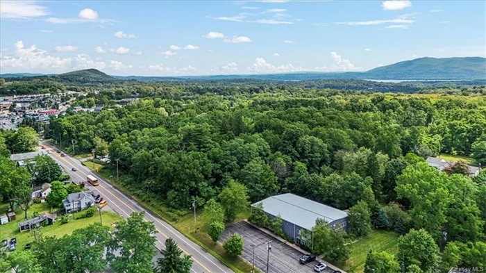 PRIME LOCATION! Nearly 10K sqft of mixed use is now available near the busy Vail&rsquo;s Gate intersection in the Town of Cornwall. This steel frame building built in 2012 offers 7500sqft of space on the main floor, with ceiling heights reaching 24&rsquo;. Currently being utilized as a professional gymnastic school with full amenities including 7&rsquo; pit with trampoline, foam mats & other equipment. Main floor consists of gymnasium, lobby with viewing windows, office, 2 bathrooms, studio & storage. Staff lounge is located on the second floor overlooking the gym, with bathroom and laundry hook up. Spacious 3 bd residential apartment with private entrance on 2nd floor offers the ability for an additional stream of income. Three phase electric with room to expand along with auto-switch Generac generator. Building sits on 1.2 acres within the HC zoning district and offers parking for up to 40 cars. Municipal water and sewer. This location sees over 18K cars a day and is well suited for a variety of businesses. Bring your ideas!