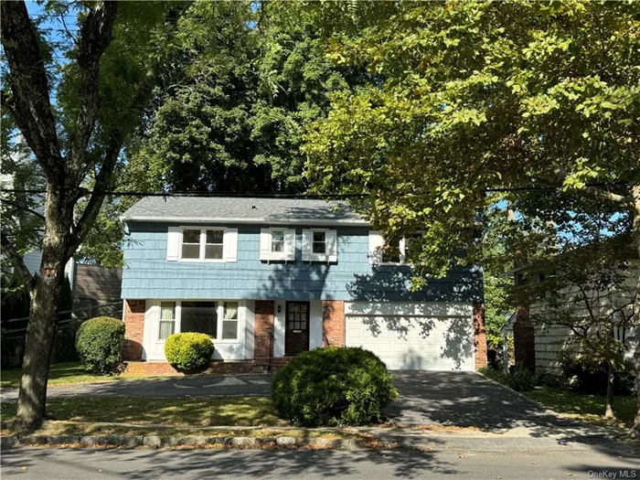 A gorgeous find in the middle of impressive Village of Larchmont. Convenient to all this highly respected town has to offer  train station to NYC, shopping, restaurants, schools and much more. Multiple parks nearby and about a mile to the Long Island Sound (yacht clubs and beaches). This spacious 4BR 2.5 bath is a front back split home with a timeless style. Welcomed by a large living room with huge picture window overlooking a circular driveway. This open concept living expands up just a few stairs into a dining area that overlooks the living room. Accompanied by a half bath, bonus family room, and large freshly painted eat-in kitchen, dedicated laundry room and storage, and with access to the expansive patio. A few more steps up there are 3 generously sized bedrooms, each with walk-in closet and 2 full baths on this level. Up a few more steps is a very large bedroom/multi-purpose room with a sleeping loft. Great for office space! It has a walk-in closet and access on the same level to an unfinished attic with potential to expand. Additional storage in a full basement and a 2-car garage. All new hardwood flooring throughout; 2 brand new energy efficient HVAC units; roof replaced in 2018 and all windows replaced around the same time. Hurry to make an appointment to see the hidden jewel, before it&rsquo;s too late.