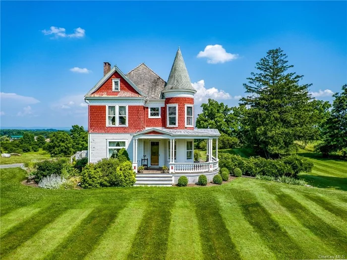 Embrace the charm and grace of a Queen Anne style masterpiece nestled on 12.37 acres of historic Hudson Valley farmland, at the Village of Athens edge. This architectural gem is a testament to timeless design, featuring classic elements such as a distinctive turret, wood shingles, and a roof adorned with multiple gables. Approach the home and be welcomed by a rounded covered wraparound porch, inviting you into a sanctuary of original details including unpainted wood moldings, wood floors, high ceilings, and leaded glass windows that frame breathtaking views of the landscape and serene pond. Step through the entryway with its beautiful beveled glass doors and vestibule, leading to a side hall staircase boasting an original balustrade from the period. The front living room and den are seamlessly connected by elegant pocket doors and a wood burning fireplace, perfect for intimate gatherings or quiet relaxation. Upstairs, discover three bedrooms and a generously sized bathroom, alongside a walkup unfinished attic offering endless potential for expansion or customization. The updated kitchen pays homage to the home&rsquo;s heritage with a farmhouse sink, beadboard ceiling, and large pantry complete with laundry facilities. Stainless steel appliances add modern convenience while maintaining the charm of yesteryear. Outside, enjoy the expansive grounds featuring a picturesque pond, 3 large barns, and panoramic views of the Berkshire Mountains. A stone patio invites outdoor dining and relaxation, making it an ideal setting for entertaining amidst the natural beauty of the Hudson Valley. Don&rsquo;t miss this rare opportunity to own a piece of history where elegance meets tranquility. Schedule your private tour today and envision the possibilities of calling this remarkable property your home.