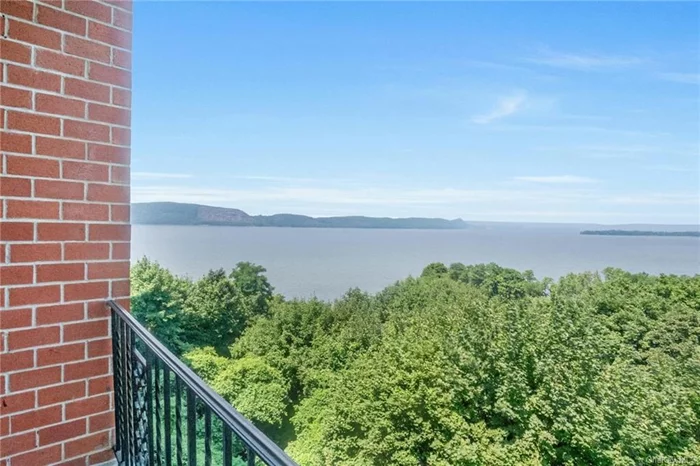 Breathtaking Hudson River views and stunning sunsets from every room from this spacious 2-bedroom, 2-bath Scarborough Manor apartment. This updated unit features 9&rsquo; ceilings, an updated kitchen and updated bathrooms, generous closet space, ideal for downsizing or easy living. Enjoy morning coffee on the covered balcony overlooking the Palisades. The primary bedroom suite offers a dressing area, four closets, one is cedar-lined, while the second bedroom provides flexibility for guests or a home office. The building is meticulously maintained with updated windows, efficient HVAC, and a full generator. Monthly charges cover real estate taxes, gas, heating, water, and access to amenities such as an outdoor pool, clubhouse, fitness room, billiards, saunas, and a 24-hr gatehouse. Conveniently located near shopping, the Scarborough train station, restaurants, golf courses, and highways, Scarborough Manor promises a carefree lifestyle in a coveted location.