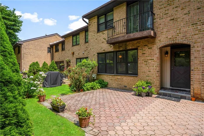 The pool is open! Oh my! With its front and rear patios, second floor balcony, and indoor garage space, this 2000 square foot, 3 bedroom, 2.5 bathroom condo townhouse located in Yonkers has so much to offer. This super sunny tri-level townhouse features an eat-in kitchen with granite counters, a newer refrigerator, new microwave, new stove and stainless steel appliances and the pass-thru kitchen to the dining area is simply charming. Up to the second floor for the primary bedroom (so much light!), dressing area, walk-in closet and private primary bathroom with a shower. The third level ( just a few steps up!) offers 2 additional bedrooms with great closet space with a balcony and a hall bath with a bathtub. The lower level features the laundry room, powder room and a wonderful family room leading to the second (rear) patio. Newer furnace! Pets welcome, the pool is open, and you will love the playground area. Did I mention the clubhouse? A wonderful opportunity and close to fine dining and highways too. Welcome to the Willows!