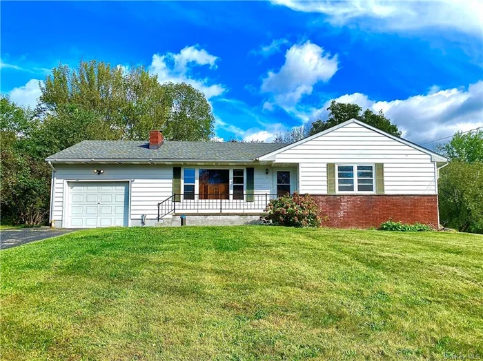 Just outside the Village of Rhinebeck, this 2 bedroom, 2 bath ranch is sited high on a beautiful lot that overlooks a horse farm in back. There&rsquo;s a large deck and patio in back and a private, level yard. There is a 21-foot living room, an open dining room, and a nice kitchen. There are two bedrooms, one with an ensuite bath and a second full bath in the hall. This home has an oversized attached one car garage, a full unfinished basement, BB hot water heat, newly re-finished oak floors, and has been recently painted inside. Brand new driveway. We require a credit score of at least 680 and good references.